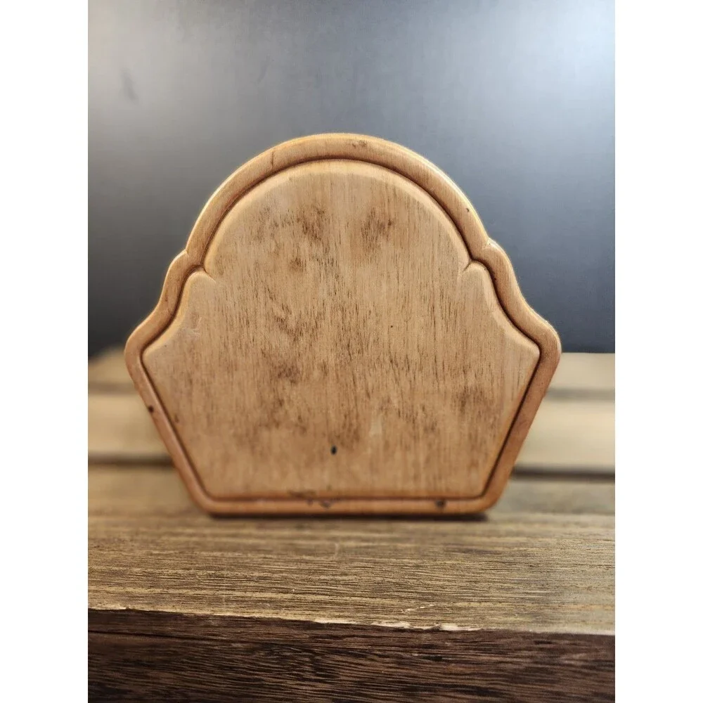 vintage wooden napkin holder features a farmhouse-style pig